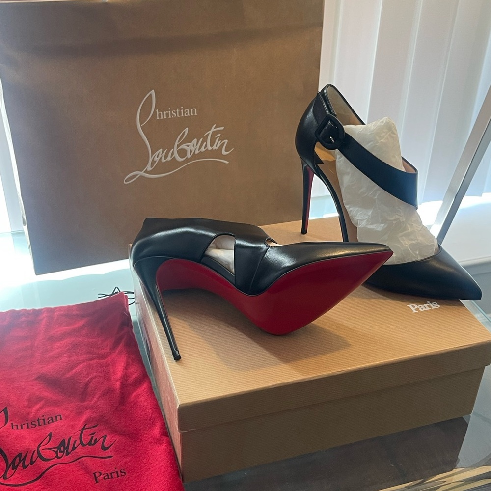 Brand new in box with tags and dust bag never worn